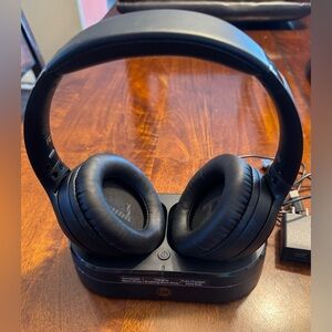 Black Wireless Headphones with Charging Dock, damaged box. original paperwork,